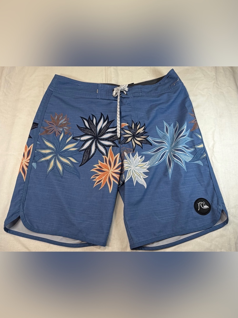 Quiksilver Blue Floral Boardshorts with Orange Accents